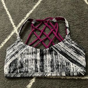 Lululemon Free To Be Wild sports bra in Heat Wave White/Black and Regal Plum